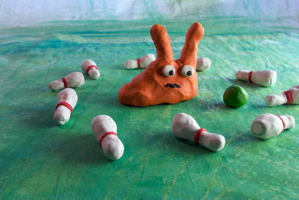 claymation with a cute orange slug